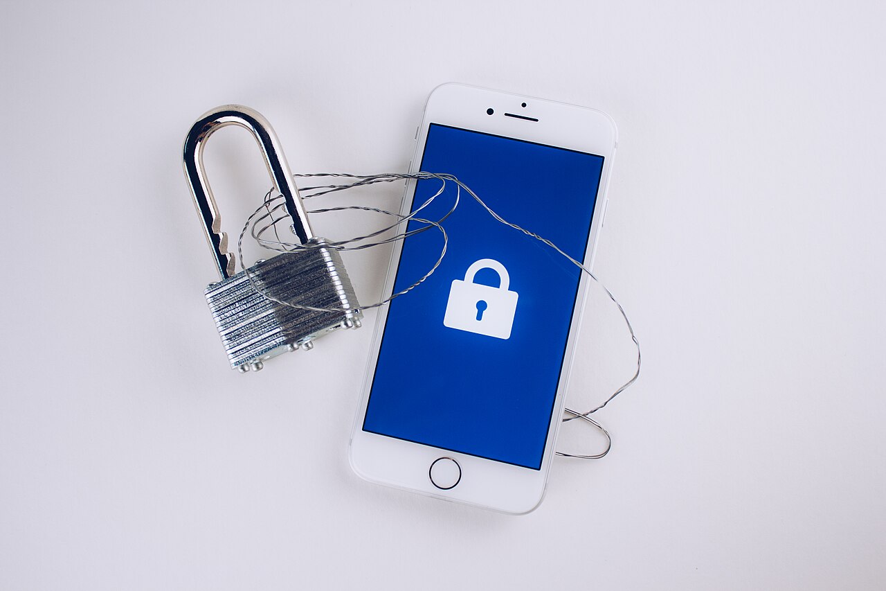 Smartphone secured with a padlock representing a private social media target